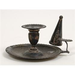 A George IV Silver Chamberstick, inscribed, with gadrooned edging, London 1825  See illustration...