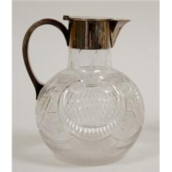 A Victorian Cut and Engraved Glass Claret Jug, with plated mounts, 18 cm  See illustration £ 70 -...