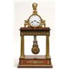 Image 1 : A French Empire Portico Clock, the circular enamel dial signed "Barnou a paris" with Roman numera...