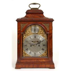 A Late 18th Century Mahogany Bracket Clock, the 17 cm arched square brass and silvered dial signe...