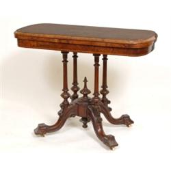 A Victorian Burr Walnut Card Table, the rounded rectangular top inlaid with boxwood and cross ban...