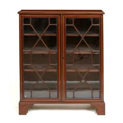 A Late 19th Century Mahogany Bookcase, having a pair of astragal bar glazed doors, enclosing adju...