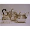 A WALKER AND HALL THREE PIECE TEA SERVICE, bombe shapes, gadrooned rims, Sheffield 1909 (approxim...