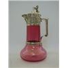 Image 1 : A RUBY COLOURED GLASS CLARET JUG, Elkington & Co plated heraldic mount, (replacement glass body) ...