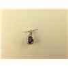 Image 1 : ONE 14KT WHITE GOLD NATURAL PURPLE SAPPHIRE AND DIAMOND SET PENDANT. THE PENDANT IS PAVE SET WITH A