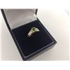 Image 1 : ONE LADIES 10KT YELLOW GOLD AND RHODIUM FINISH NATURAL PERIDOT AND DIAMOND SET DRESS RING. SET WITH