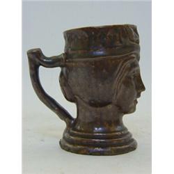 A QUEEN VICTORIA COMMEMORATIVE MUG, c. August 1837, Nottingham/Derby saltglaze brown stoneware, h...