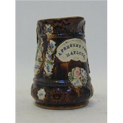 A MEASHAM BARGEWARE PITCHER, late 19th Century, applied plaque 'Present from Matlock', height 16c...