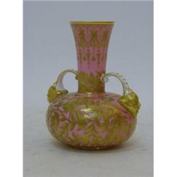 A ROYAL CROWN DERBY TWIN HANDLED LOW VASE, c.1890, gilt branch and exotic birds on a pastel pink ...