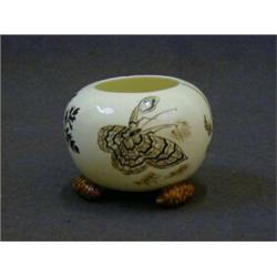 AN EMILE GALLE CERAMIC VASE, late 19th Century, painted moth and herbs on a cream ground, silhoue...