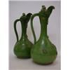Image 1 : A PAIR OF ART POTTERY EWERS, late 19th Century, mottled green glaze, applied snails and fluted di...