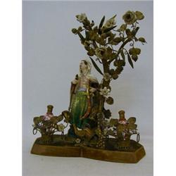 A PERFUME STAND, c.1870, porcelain Turk with scimitar and hookah standing under an ormolu tree wi...