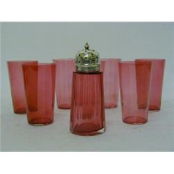 A SERIES OF SEVEN RUBY GLASS BEAKERS, and a castor (8)  £30-40...