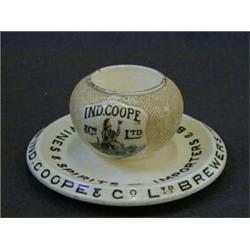 A BREWERY ADVERTISING MATCH STRIKER, 'Ind Coope Brewers, Burton and Romford', (s.d.) diameter 15c...