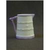 Image 1 : A ROYAL WORCESTER CREAM JUG, 1951, moulded as a coopered vessel, height 7cm  £20-30...