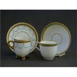 TWO 19TH CENTURY CABINET CUPS AND SAUCERS, both turquoise jewelled with gilt borders, Registratio...