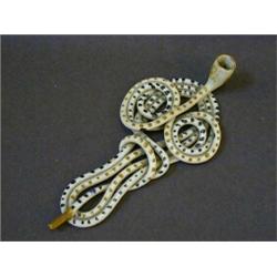 A PRATTWARE PUZZLE PIPE, c.1800, of convoluted shape, decorated in dots of dark blue and ochre, l...