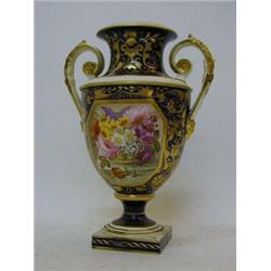A BLOOR DERBY CAMPANA VASE, on square socle base, deep blue ground, gilding reserving a floral pa...