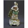 Image 1 : A CHELSEA-DERBY FIGURE, c.1765, lady with creel and fishing rod, rococo plinth, on glaze enamels ...