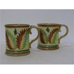 A PAIR OF DENBY 'GLYN WARE' MUGS, signatures to bases, height 10cm (2)  £30-40...