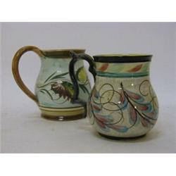 A DENBY 'GLYN WARE' MUG, signature to base, height 14cm and another, (hairline) height 15cm (2)  ...