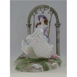 A BOXED ROYAL WORCESTER FIGURINE, 'The Swing', No.243/250, height 24cm  £100-150...