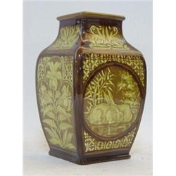 A DOULTON LAMBETH FAIENCE VASE, c.1880, of bombe form, decorated with hares, an owl and stylized ...