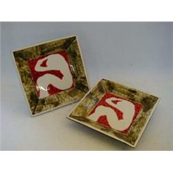 A PAIR OF JAPANESE STUDIO POTTERY WARE PLAQUES, post WWII, abstract figure designs in white, red ...