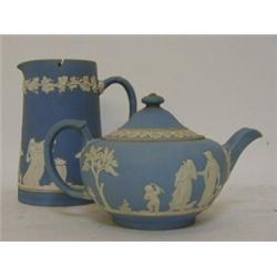 A WEDGWOOD LIGHT BLUE JASPER DIP TEAPOT, classical subjects and an Adams jug, pewter cover (2)  £...