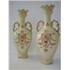 Image 1 : A PAIR OF CROWN DEVON TWIN HANDLED BALUSTER VASES, floral swags, Rd. No. 524189, height 32cm (bot...
