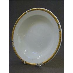 A CUNNARD STEAMSHIP CO SOUP PLATE, gilt border, maker Booths, (reputed to have been dredged off t...