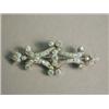 Image 1 : A diamond encrusted pierced scroll brooch set with forty nine old cut diamonds, 5.5cm long ...