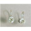Image 1 : A pair of old cut diamond solitaire earrings, rubover and millegrain set in white metal (tests...