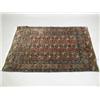 Image 1 : A Tekke rug with a stylised central pattern, 125 x 90cm approx Est. 150/200...