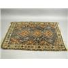 Image 1 : A Shiraz rug on a blue and brown ground with geometric patterns, 150 x 120cm Est. 150/250...