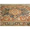 Image 1 : A large Persian design rug, of red ground with central blue and pink medallions, 350 x 110cm (...