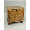 Image 1 : An early 18th century walnut chest of drawers, with a crossbanded and inlaid top with a quarte...