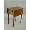 Image 1 : A George III strung mahogany work table with drop leaves, two drawers and ring turned legs, 50...