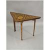Image 1 : A 19th century Dutch marquetry and mahogany fold over card table on square tapering legs, the...