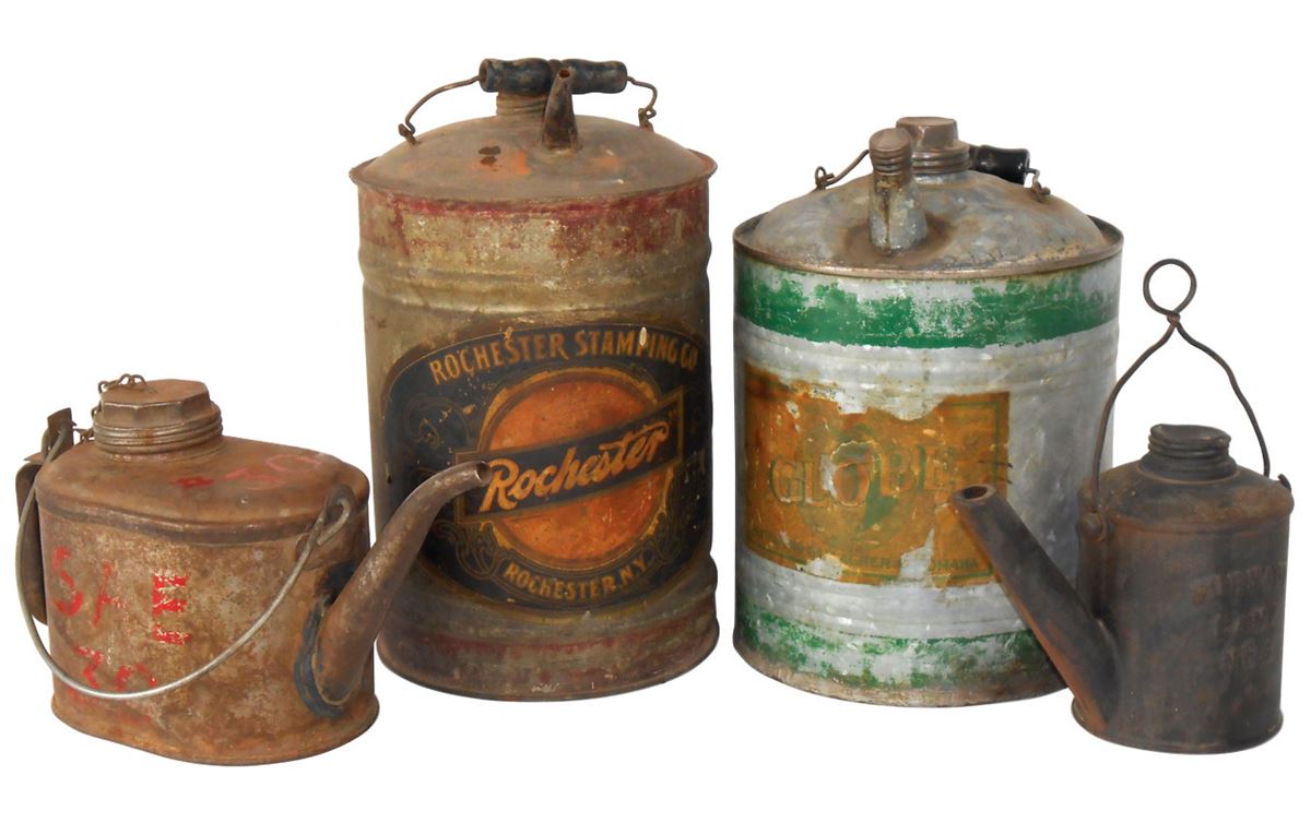 Petroliana oil dispensing cans & furnace lamp No. 2, cast iron, from