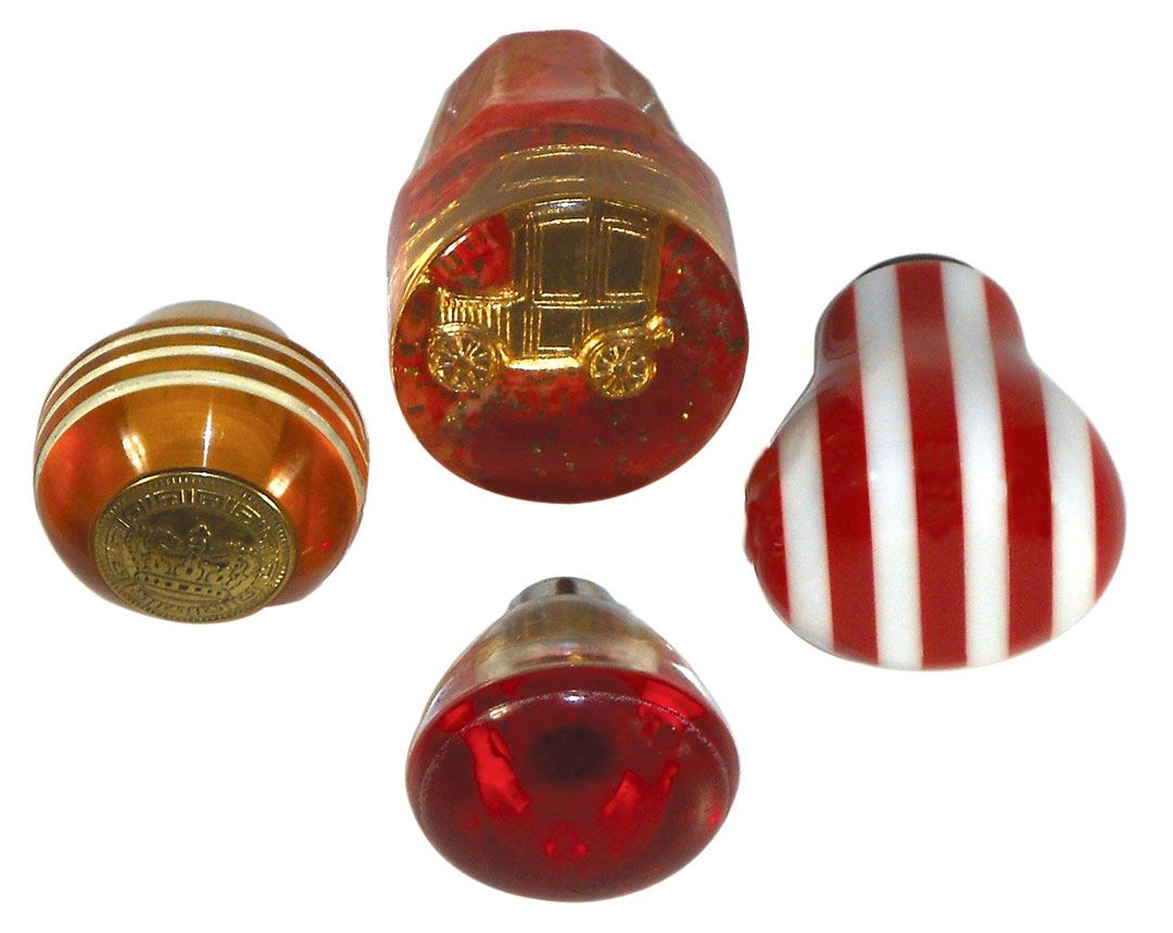Automotive shifter knobs (4), Bakelite, Lucite & plastic, one shows