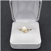Image 1 : Ladies 10 karat yellow gold ring with 1 pearl. Weighs 2.4 grams (size 6.5).