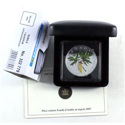 2005 $5 Coloured Silver Maple Leaf in black display box with COA issued by the Mint (toning spots) N
