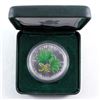 Image 1 : 2002 $5 Green 1oz. Coloured Silver Maple. Missing outer cardboard sleeve.  (no tax)