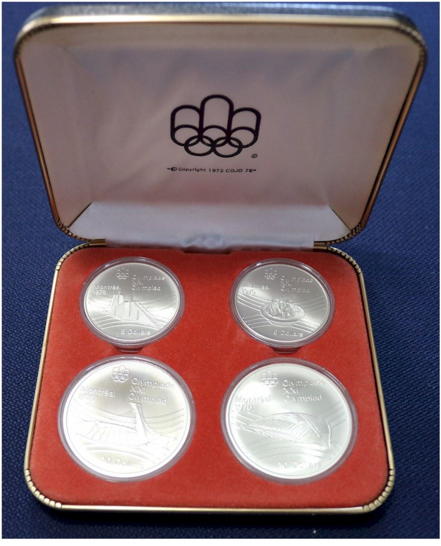 1976 Montreal Olympics Series VII 4coin sterling silver set in original box. Includes 2x 5 and 2x 1976 Montreal Olympics Series VII 4coin sterling silver set in original box. Includes 2x 5 and 2x