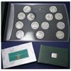 Image 1 : 2000 Specimen Millennium 12-coin Quarter Set with Medallion RCM Issue. The outer cardboard sleeve is