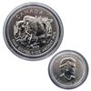 Image 1 : 2013 Canada Bison 1oz $5 Commemorative Silver Maple Leaf in capsule. The coin has very light toning.