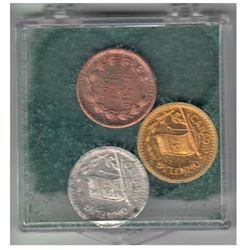 Vintage 1964 Canada's Own Flag 3-coin medal set. These small medals have turned green from the mater