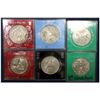 Image 1 : Lot of 6 various Great Britain hard plastic cased commemorative Crowns/medallions. You will receive 