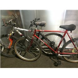 2 BIKES, BLACK SCHWINN FRONT SUSPENSION MOUNTAIN, AND ORANGE NORTH COUNTRY MOUNTAIN